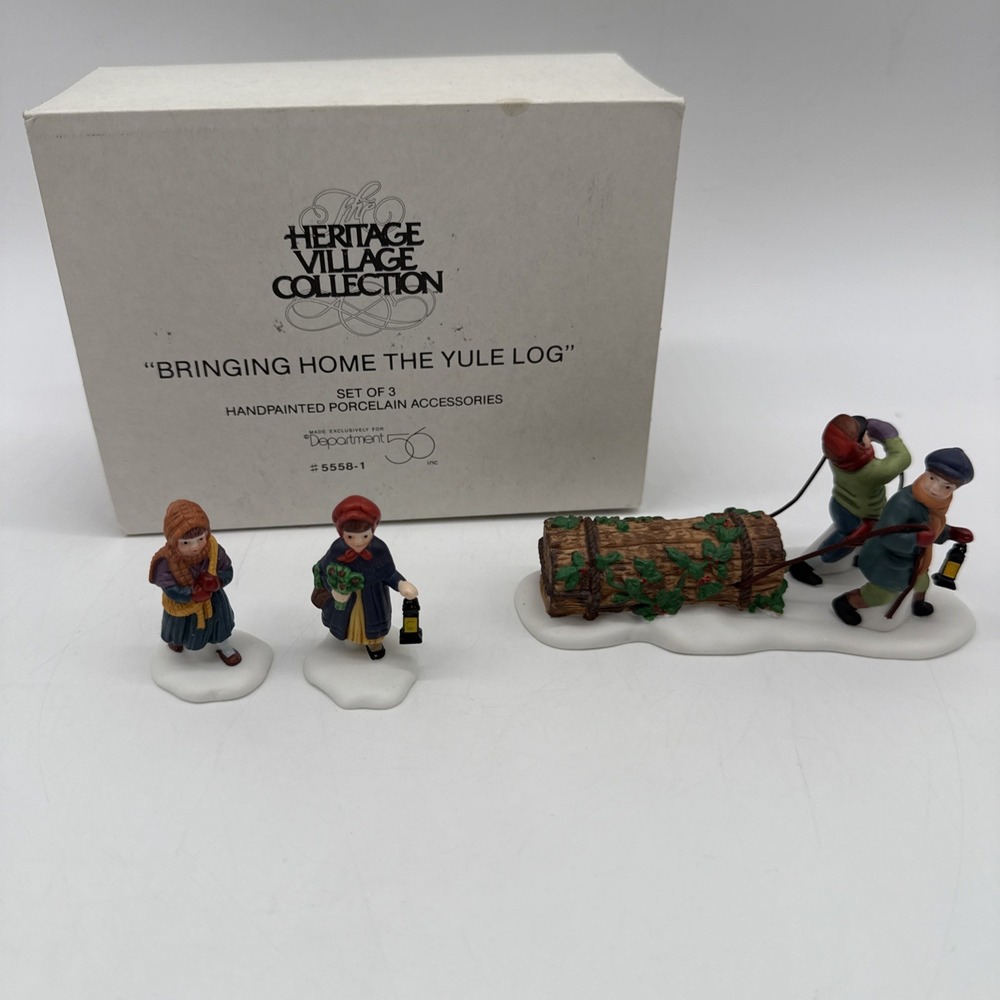 Dept 56 "Bringing Home The Yule Log" Heritage Village Collection #5558-1 - Picture 1 of 14